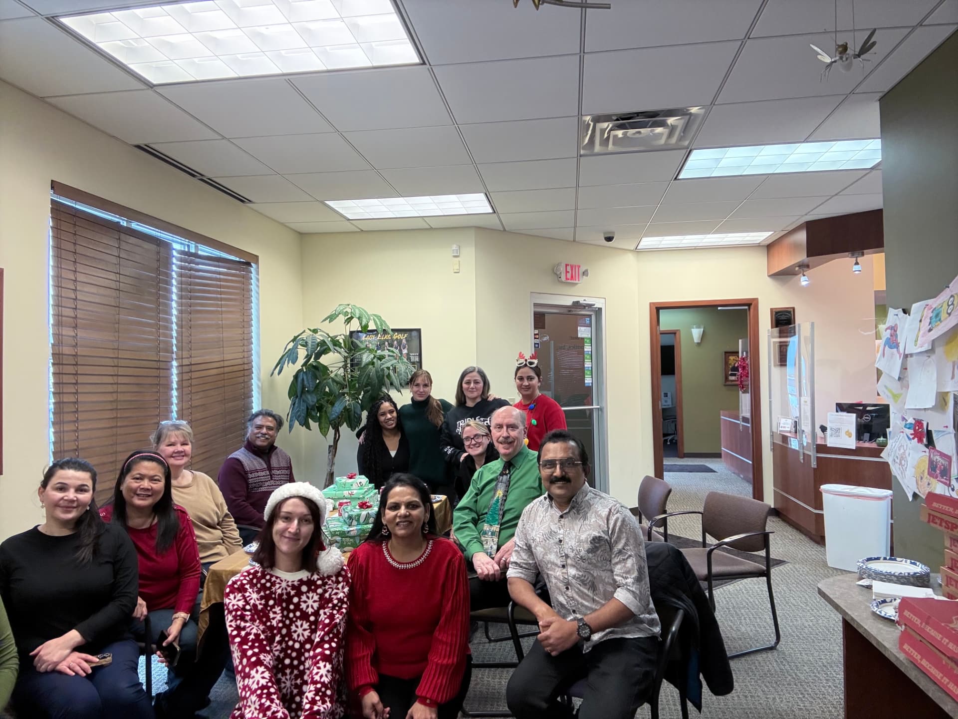 Kulkarni Orthodontics team holiday celebration in the reception area