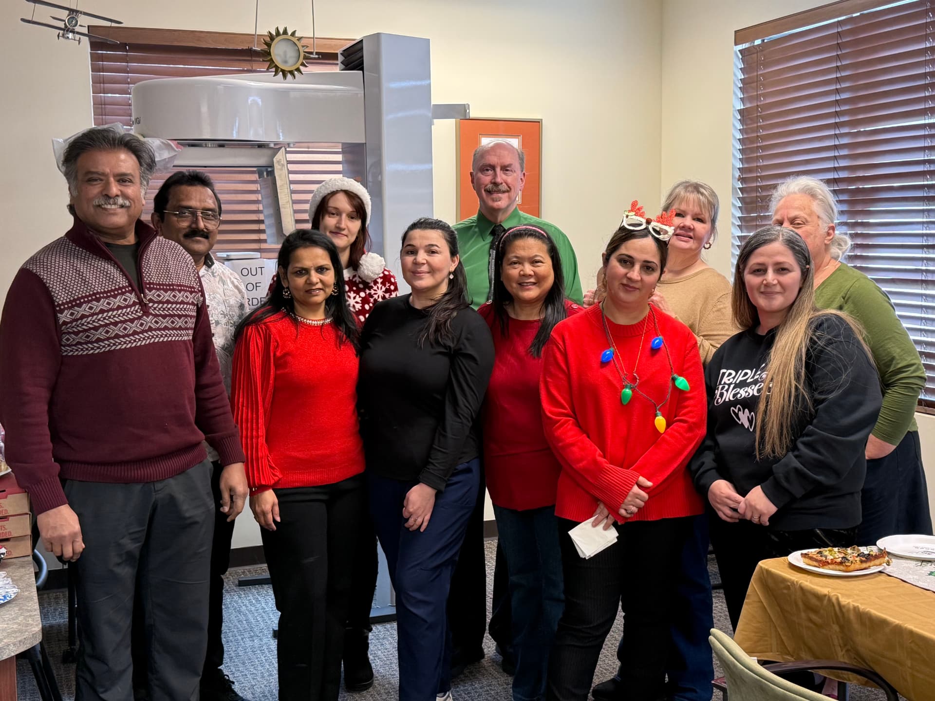 The Kulkarni Orthodontics team gathered together in the office