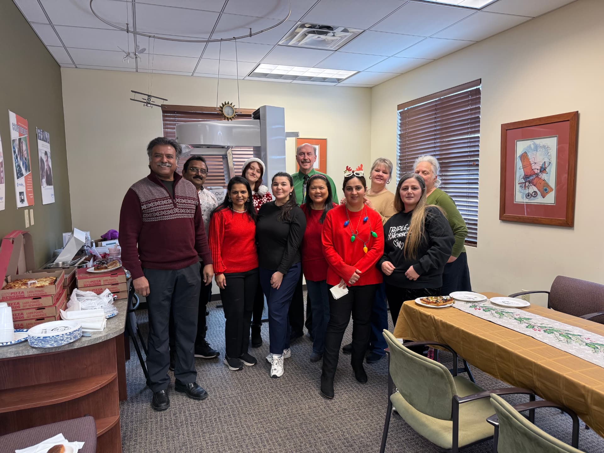Kulkarni Orthodontics staff celebrating together at the office